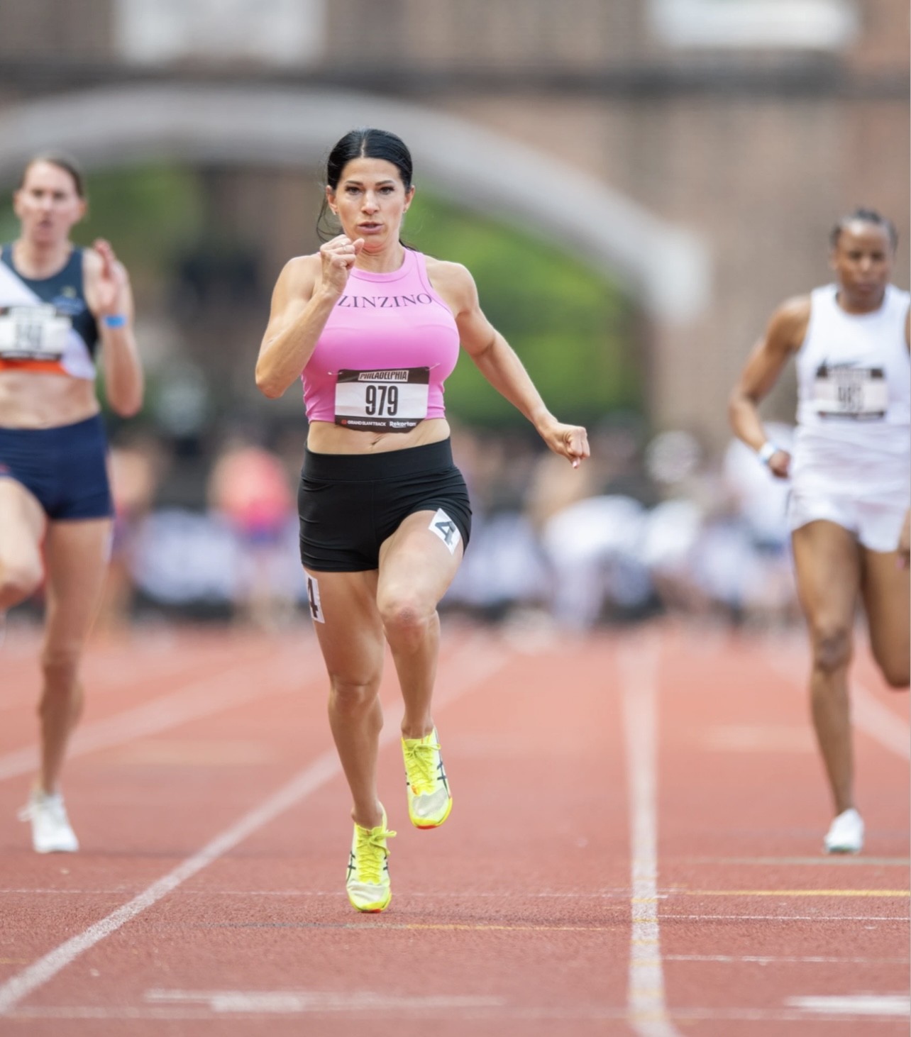 Amanda O’Connor sprinting on an outdoor track